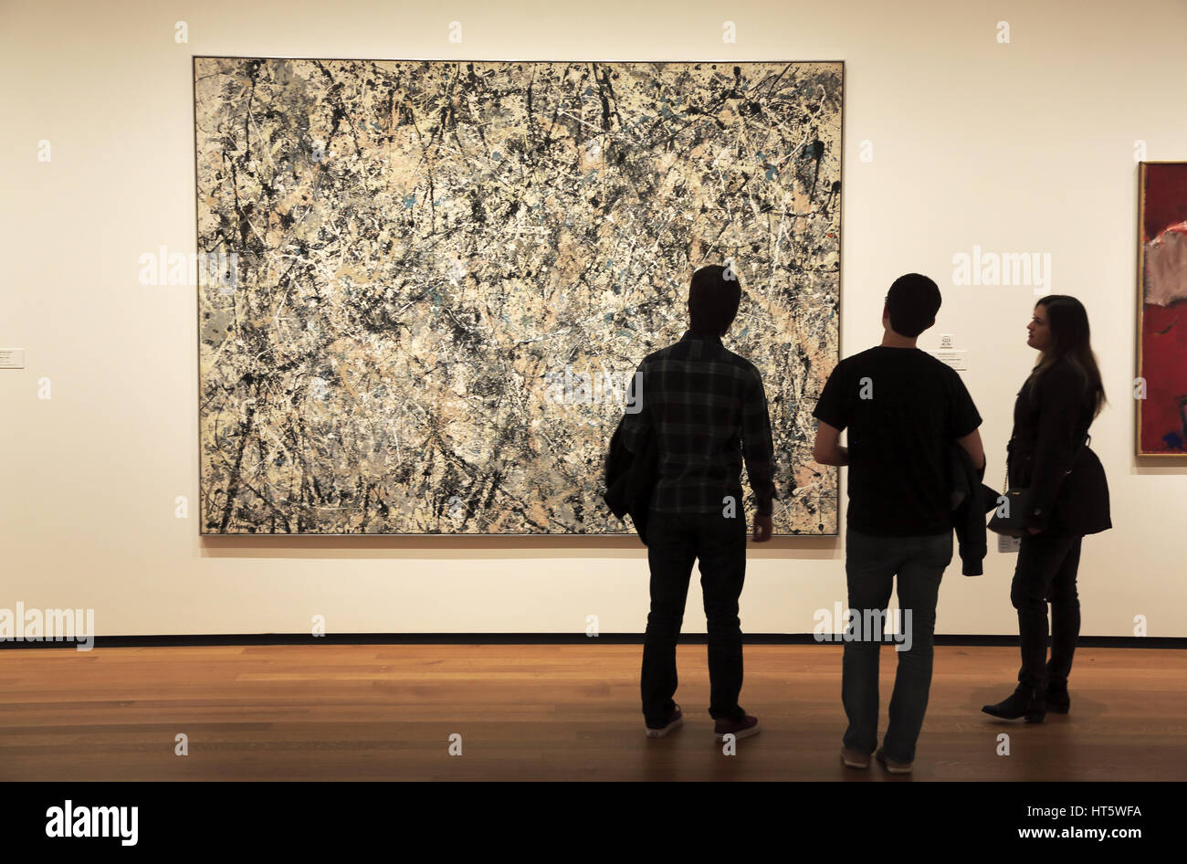 Visitors in front of Jackson Pollock's Number I, 1950 in National Gallery of Art East Building.Washington DC. USA Stock Photo