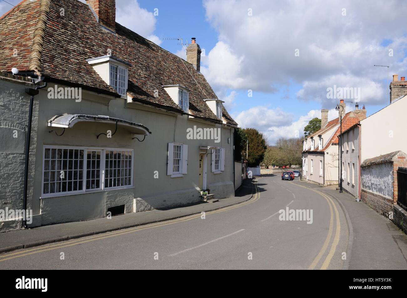 Well House and view of the High Street, Swaffham Prior, Cambridgeshire Stock Photo