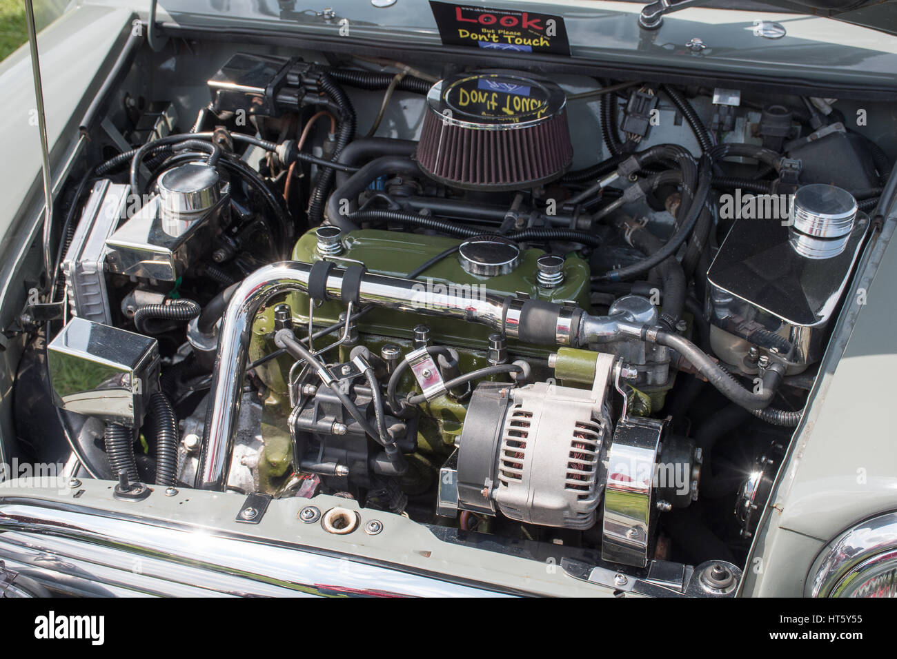 MANCHESTER, UNITED KINGDOM - JULY 11, 2015: A 1995 Rover Mini Cooper classic car engine. July 2015. Stock Photo