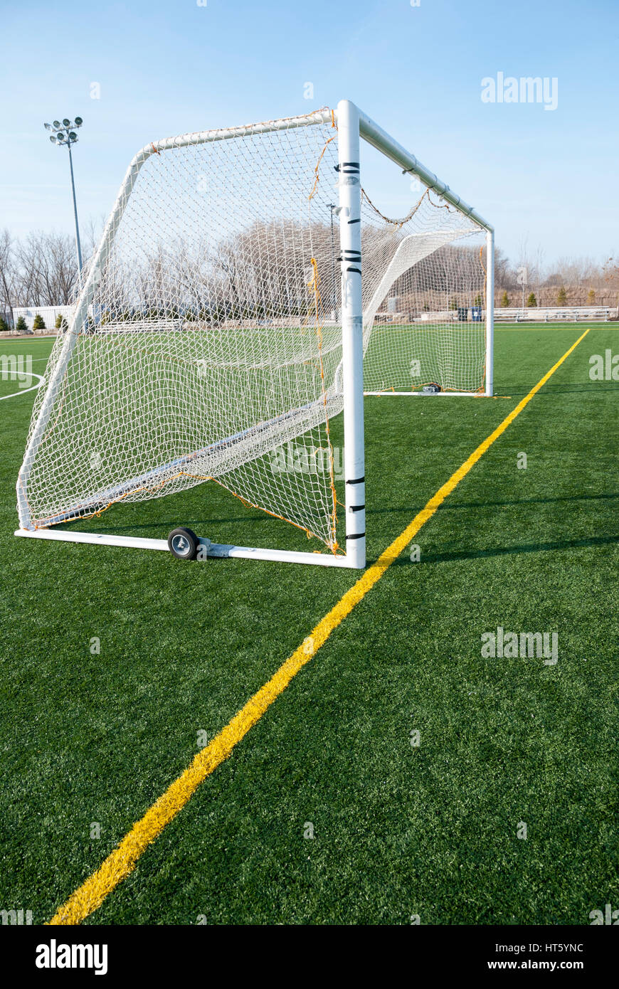 A wheeled mobile football net on a artificial municipal soccer pitch in Toronto Ontario Canada Stock Photo