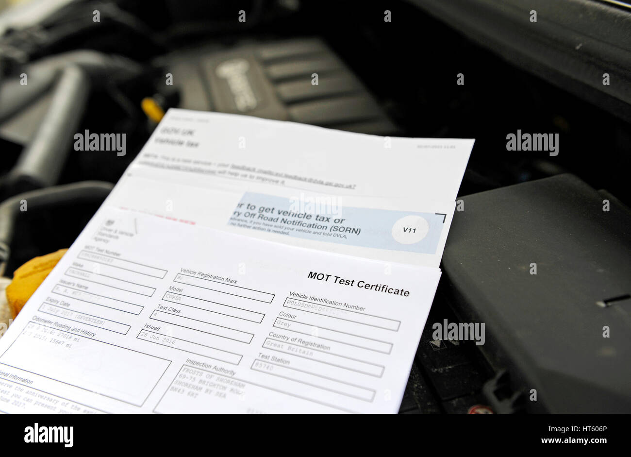 UK vehicle MOT test certificate and tax renewal form Stock Photo