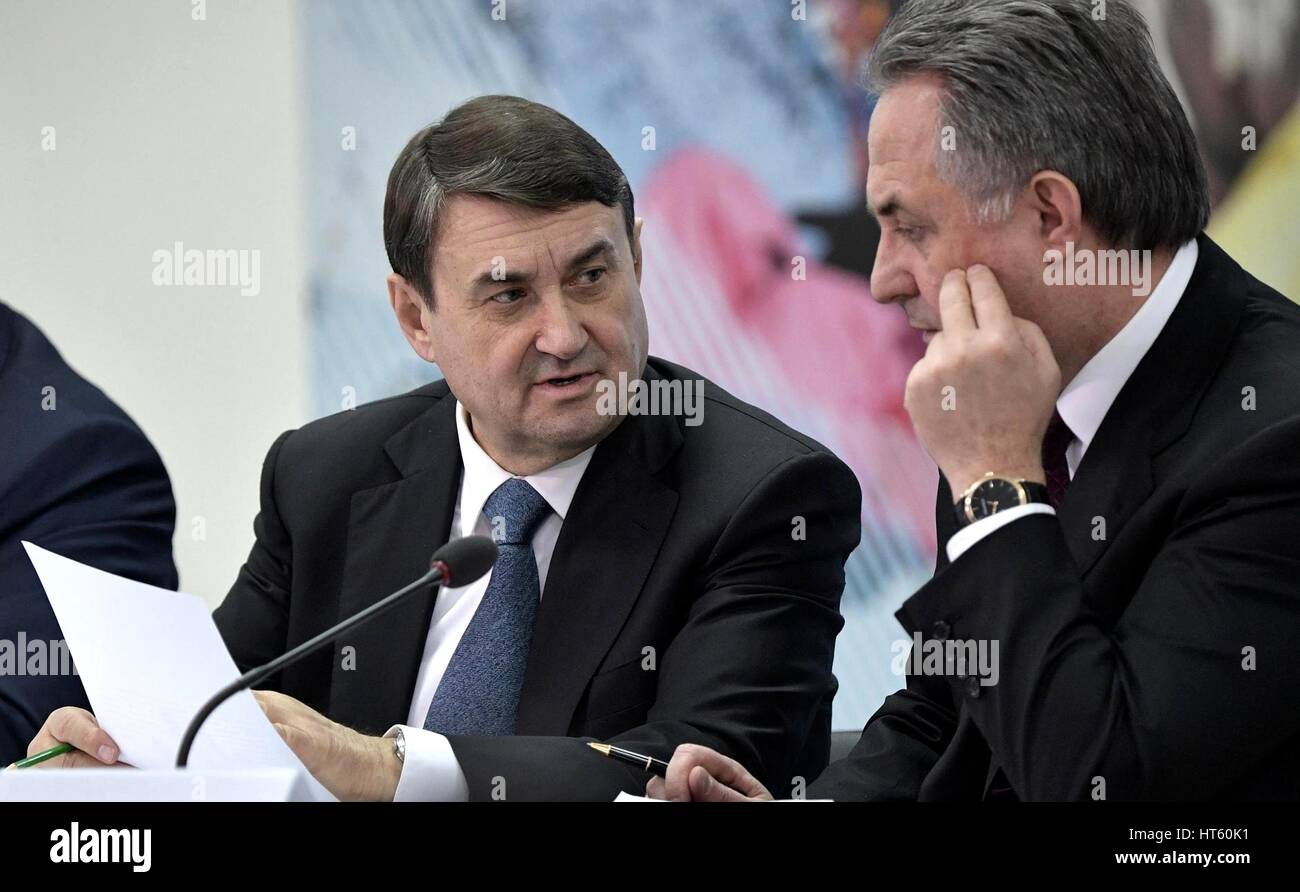 Russian Presidential Aide Igor Levitin, left, and Deputy Prime Minister Vitaly Mutko before the start of a meeting on preparations for the 29th Winter Universiade Krasnoyarsk March 1, 2017 in Krasnoyarsk, Russia. Stock Photo