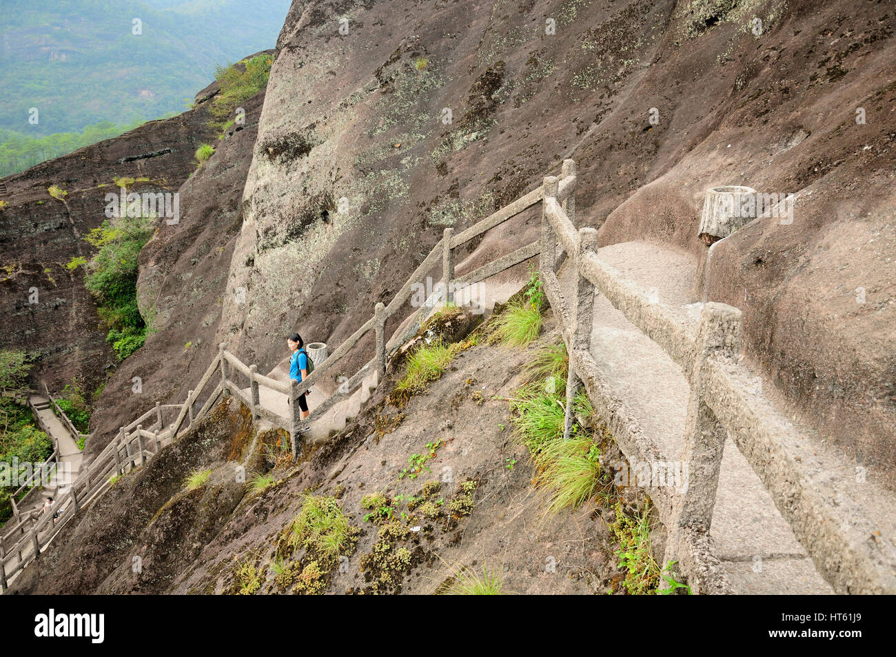 Asian woman climbing mountain hi-res stock photography and images - Alamy
