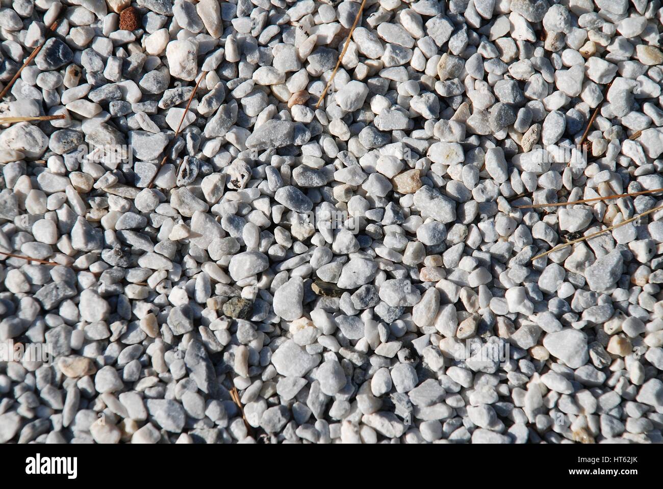 Background image of gravel on a road on the Greek island of Alonissos. Stock Photo