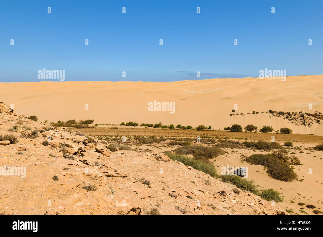 Image of an off-road car in the Oued Aoreora which is the entry to the piste Plage Blanche, Morocco. Stock Photo
