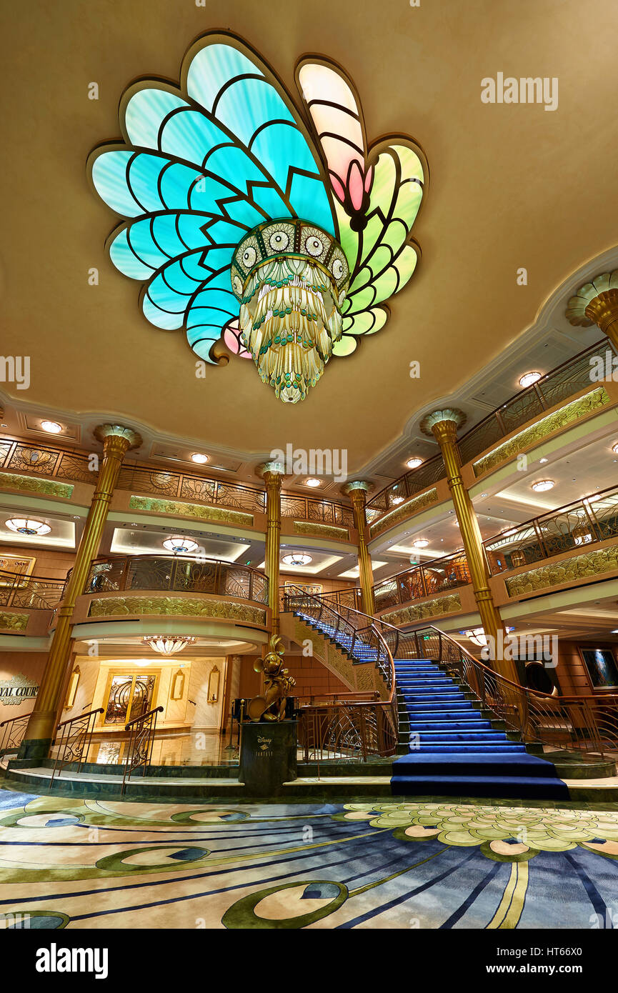 Orlando, USA - April 27, 2015: Main entrance hall in Disney cruise ship. Colorful interior of cruise ship with no people Stock Photo