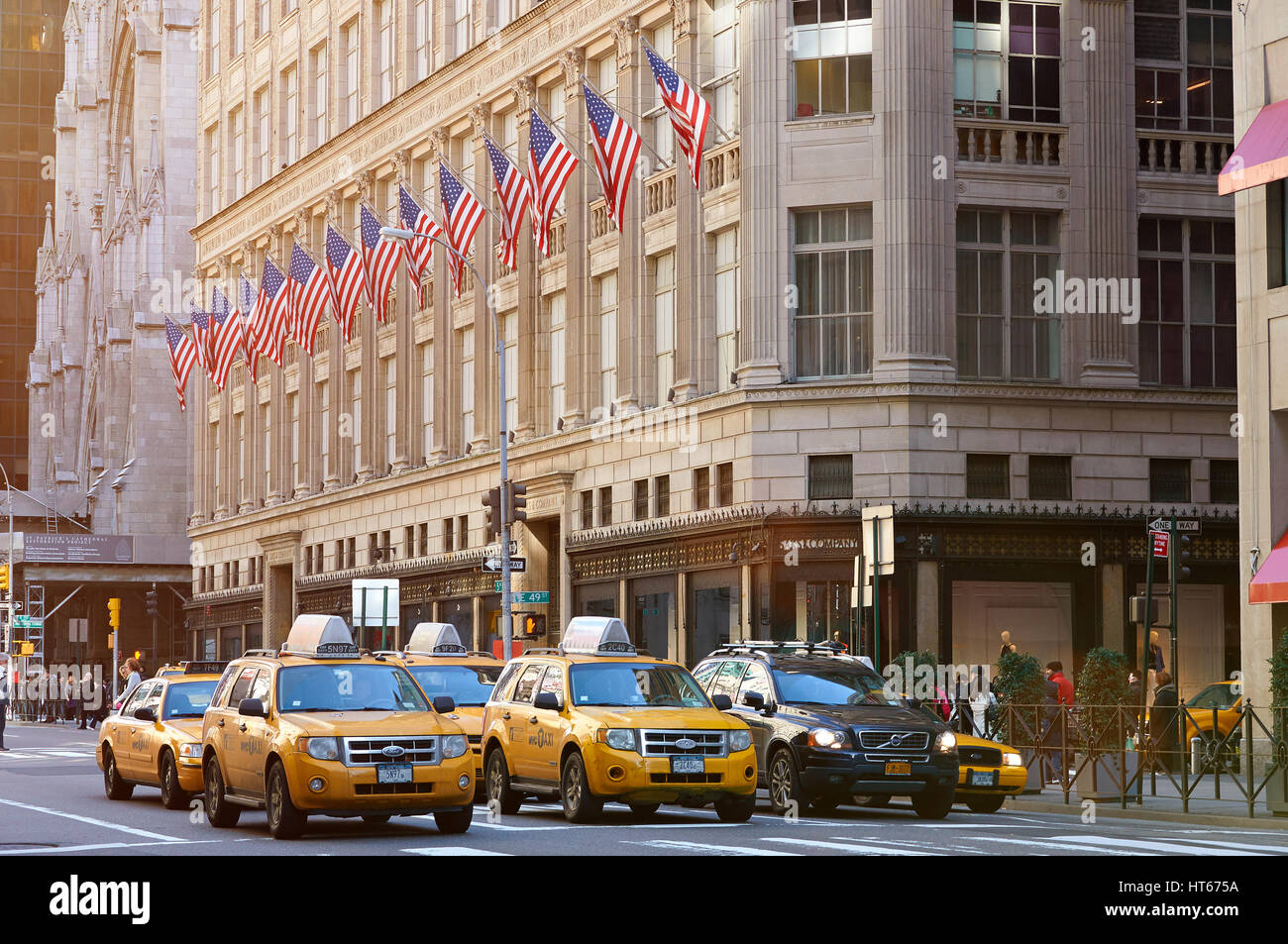New York, USA - January 28, 2012: Yellow cabs on New York street on sunny day Stock Photo