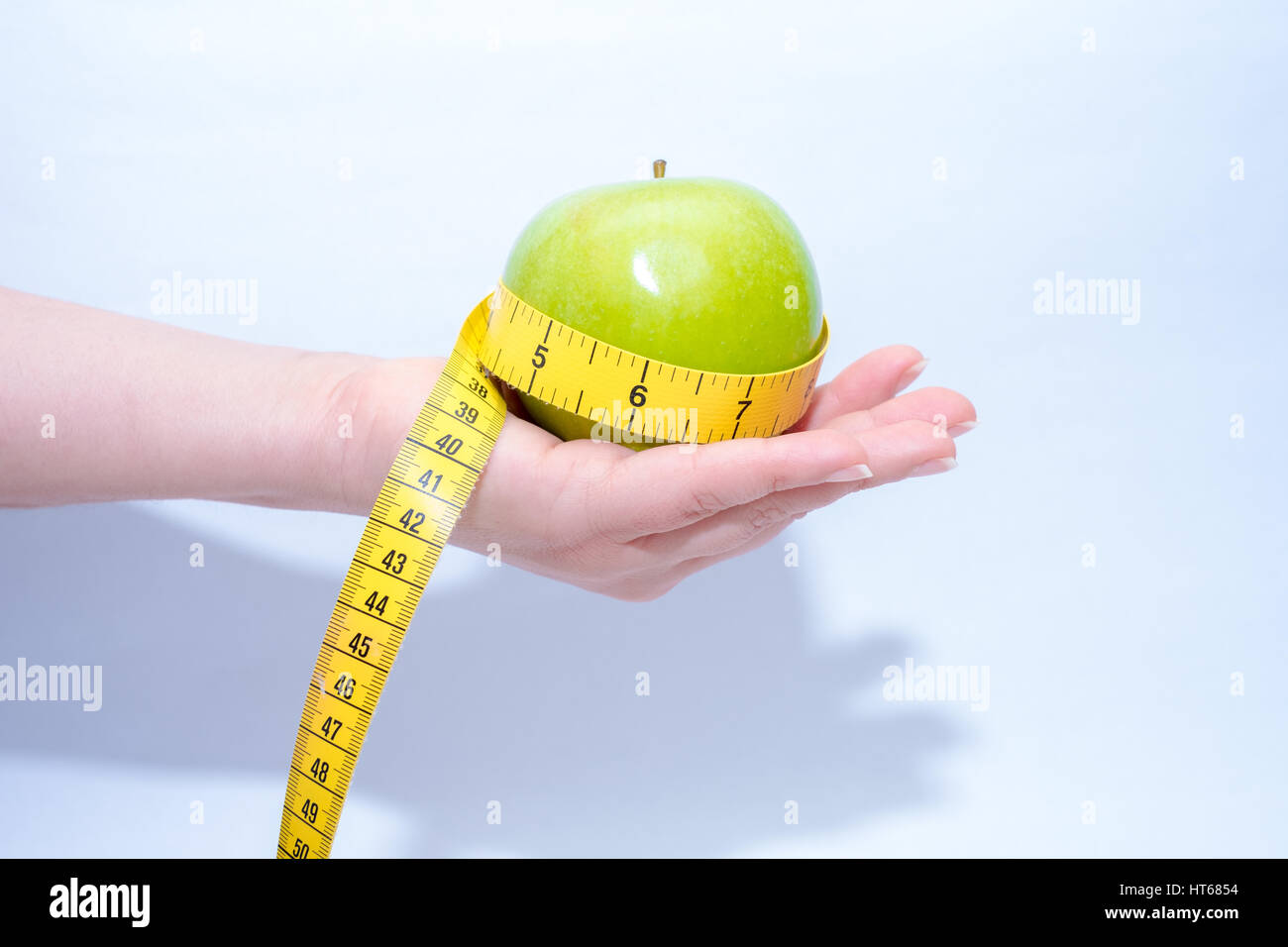 green apple measure Stock Photo - Alamy