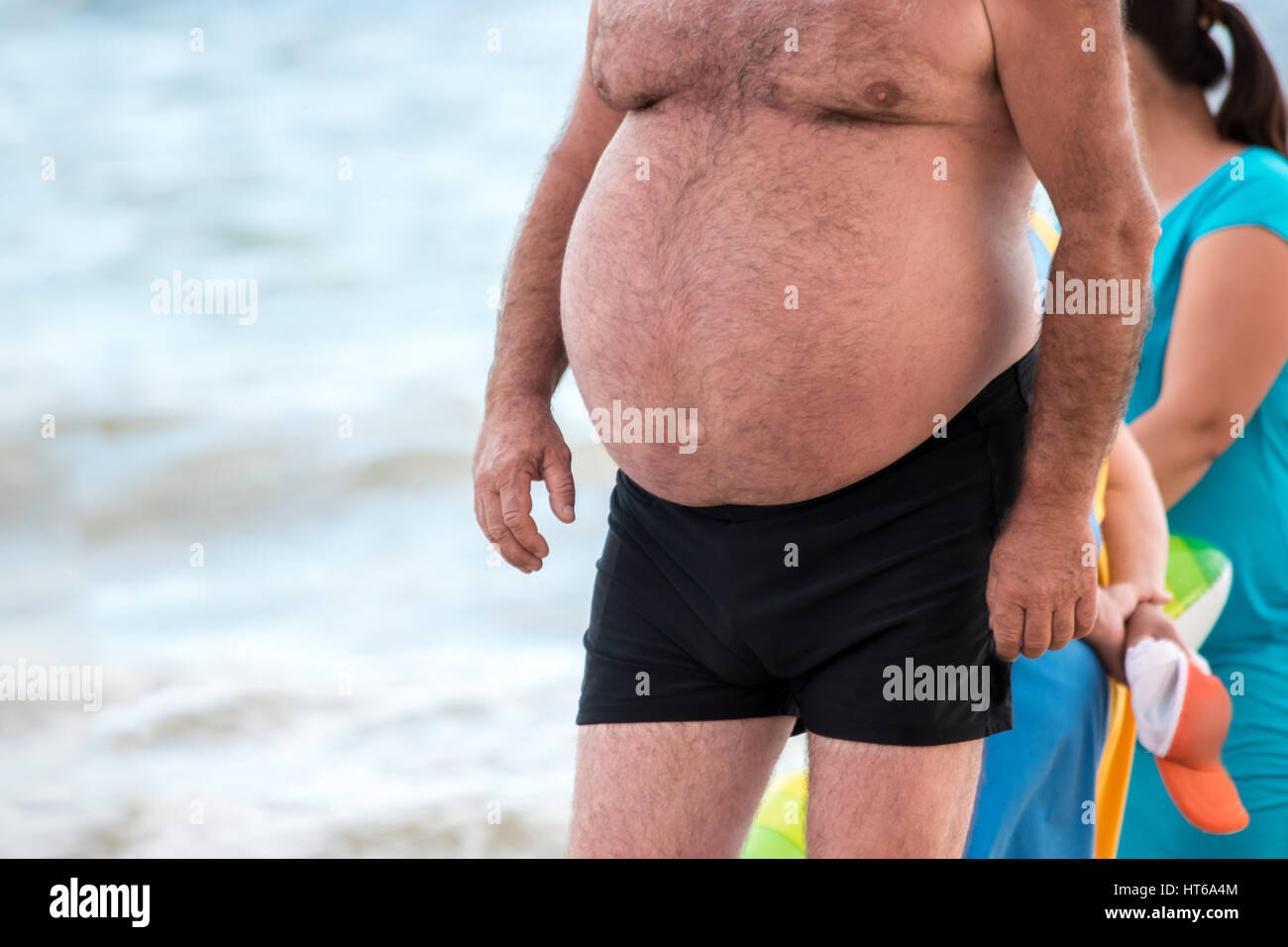 Fat guy beach hires stock photography and images Alamy