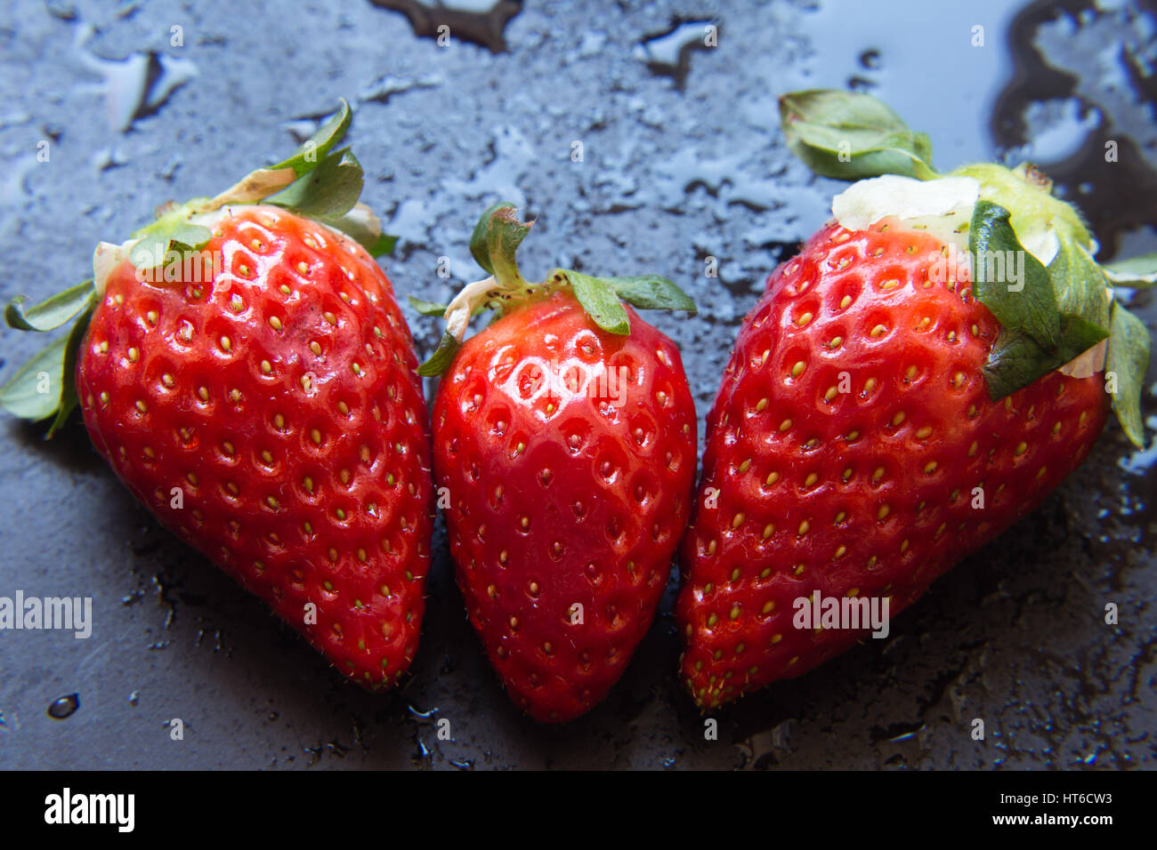 Fresh strawberry. Red strawberry on dark background Stock Photo - Alamy