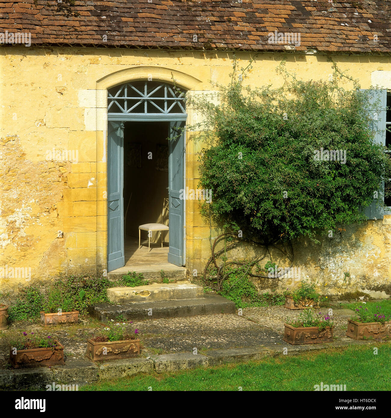 Open door to garden Stock Photo Alamy