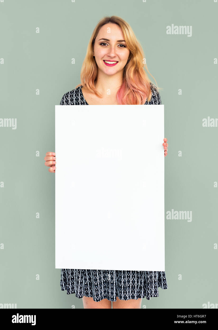 Woman holding placard hi-res stock photography and images - Alamy