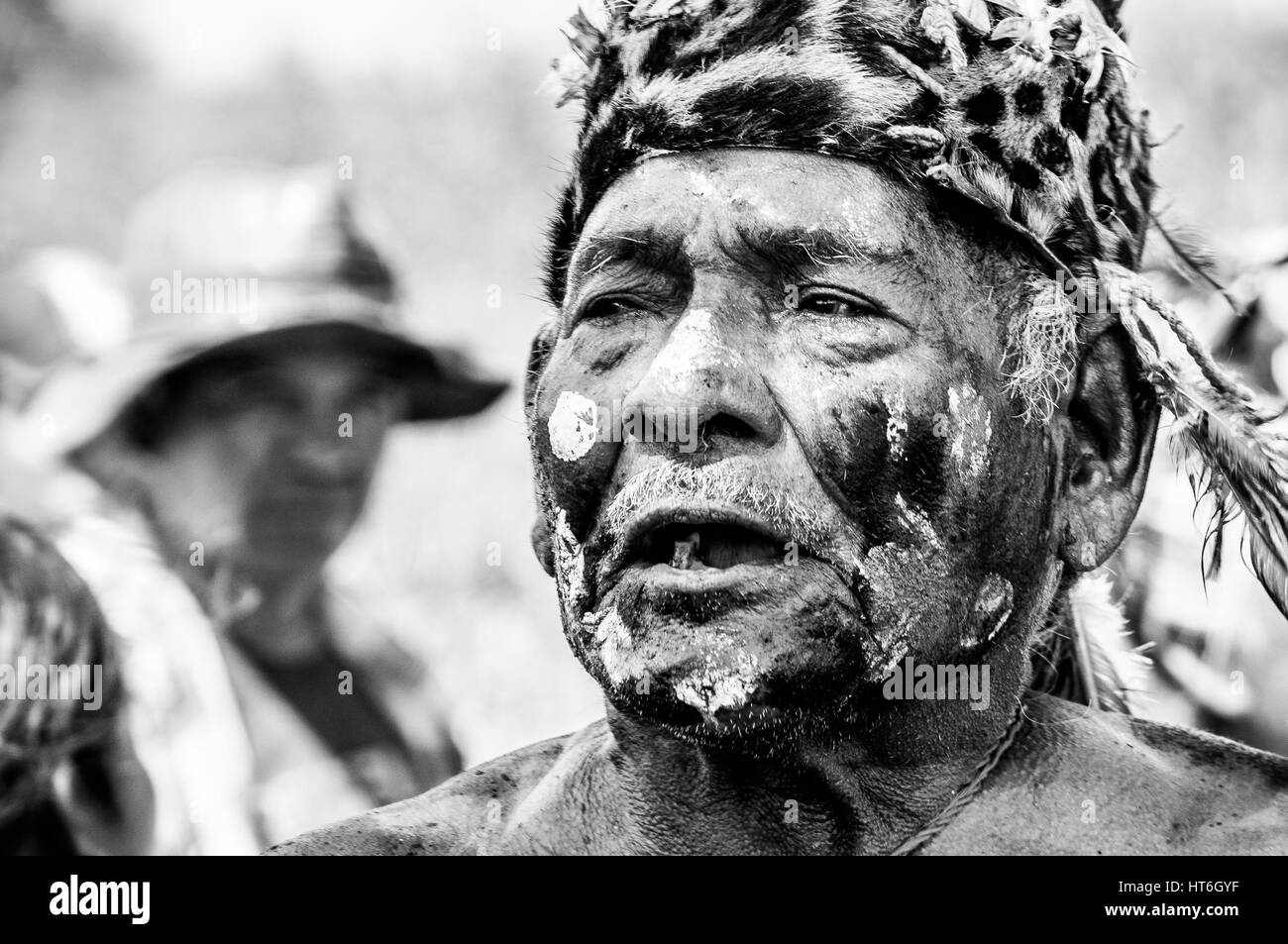 Puerto Pollo, Paraguay on August 8, 2015: Old Paraguayan indigenous man with face paintings from the Yshir tribe at a traditional ceremony Stock Photo