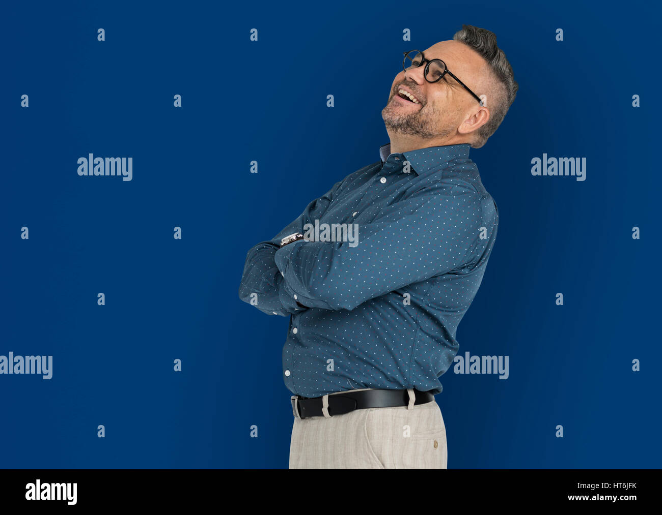 Caucasian Man Folding Arms Smiling Stock Photo Alamy