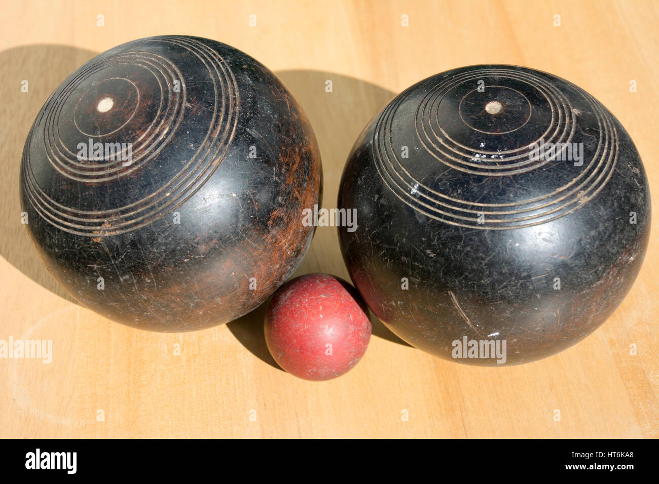 Two old bowling balls and a jack or kitty Stock Photo