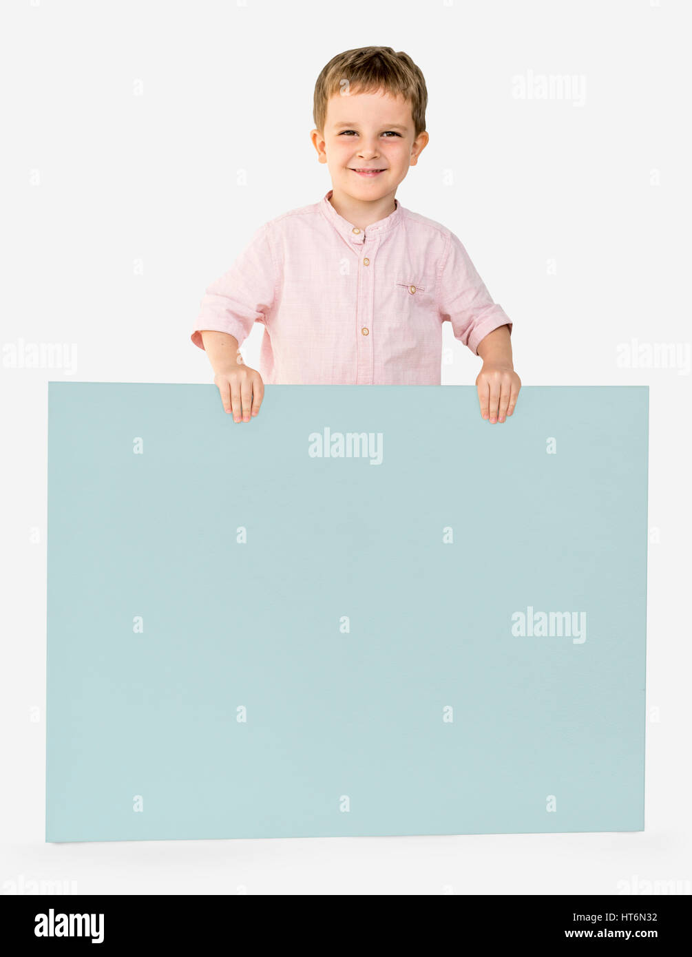 Little Boy Holding Empty Paper Smiling Stock Photo - Alamy