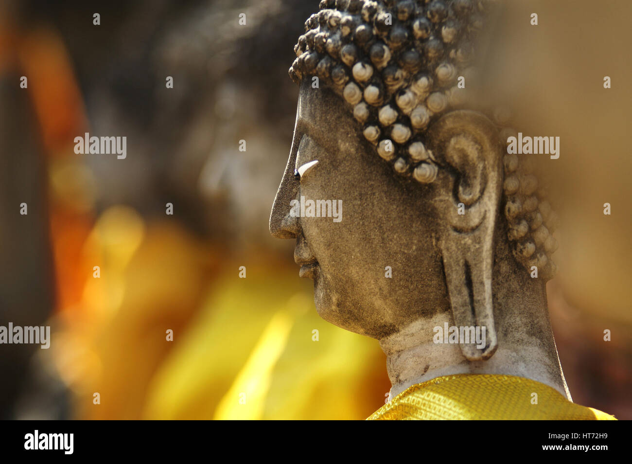 Close up of a Buddha statue at Wat Yai Chai Mongkol in Ayutthaya, Thailand. Stock Photo