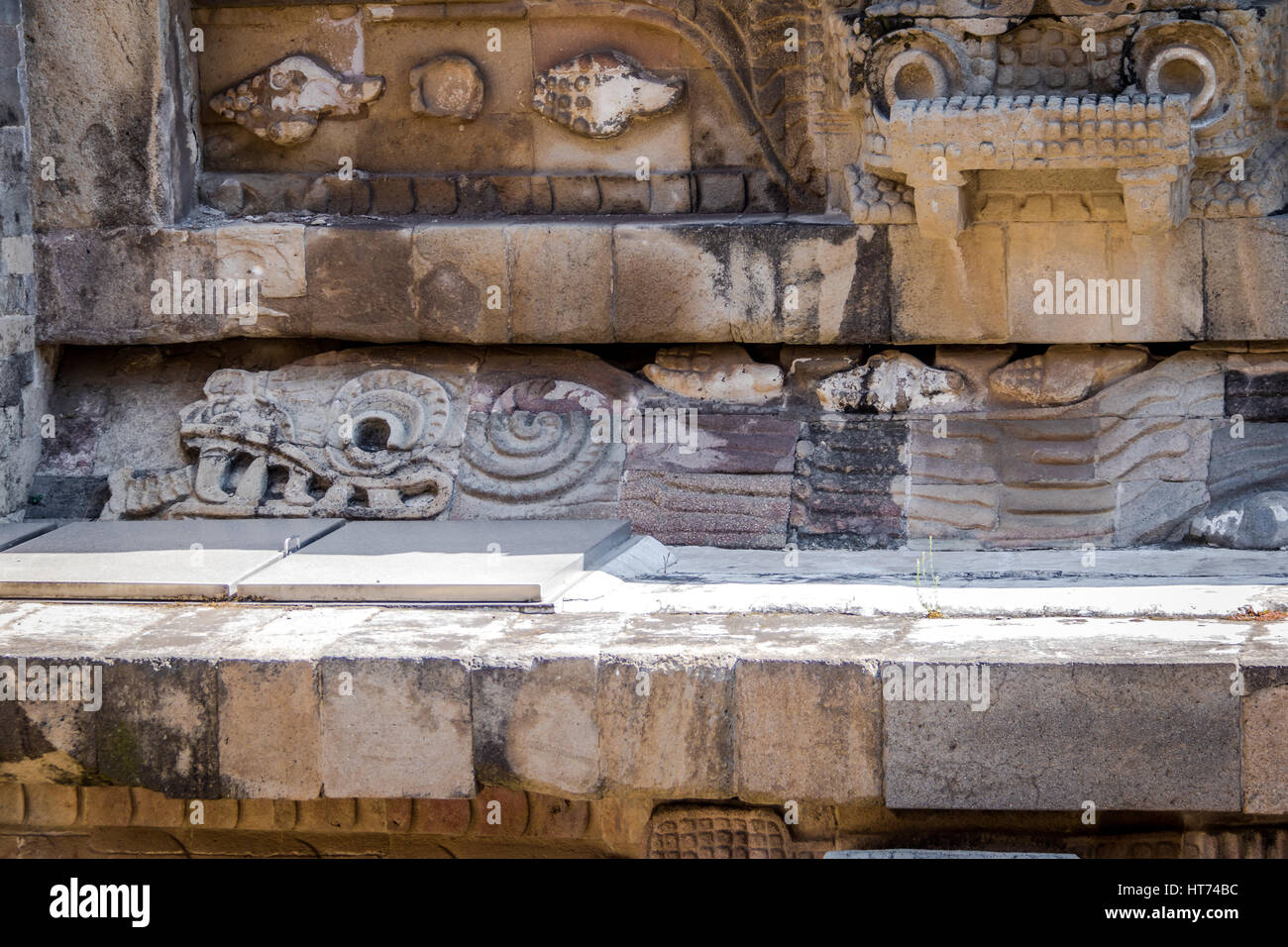 Carving details of Quetzalcoatl Pyramid at Teotihuacan Ruins - Mexico City, Mexico Stock Photo