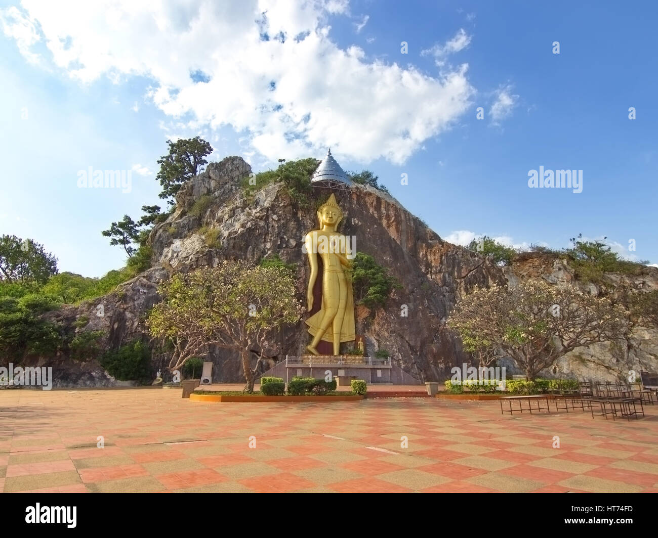 Buddha on the cliff at Khoa Ngoo in Ratchaburi, Thailand Stock Photo