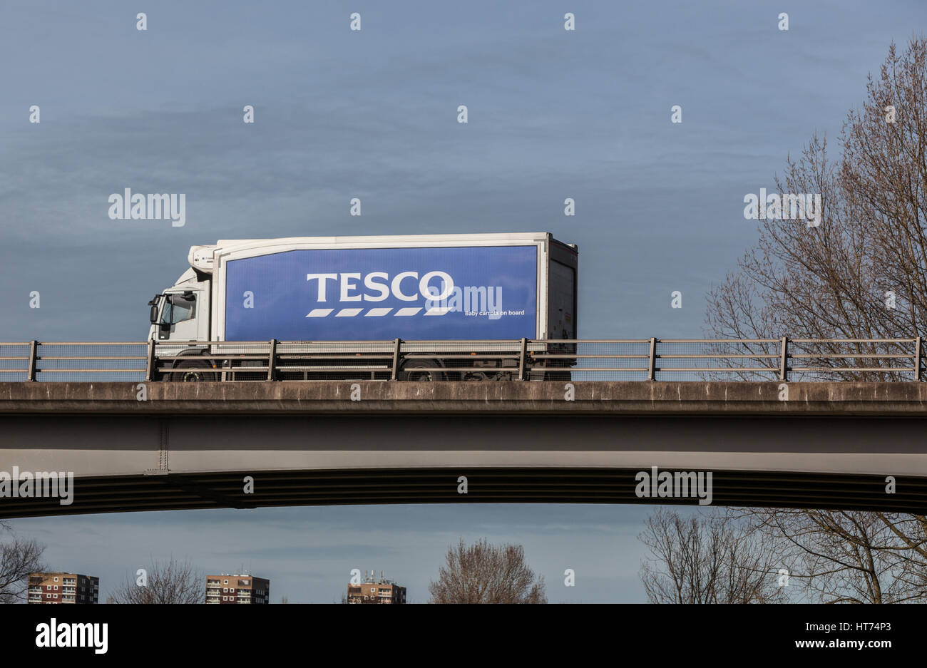 Tesco delivery truck distributing stock to stores. Travelling through