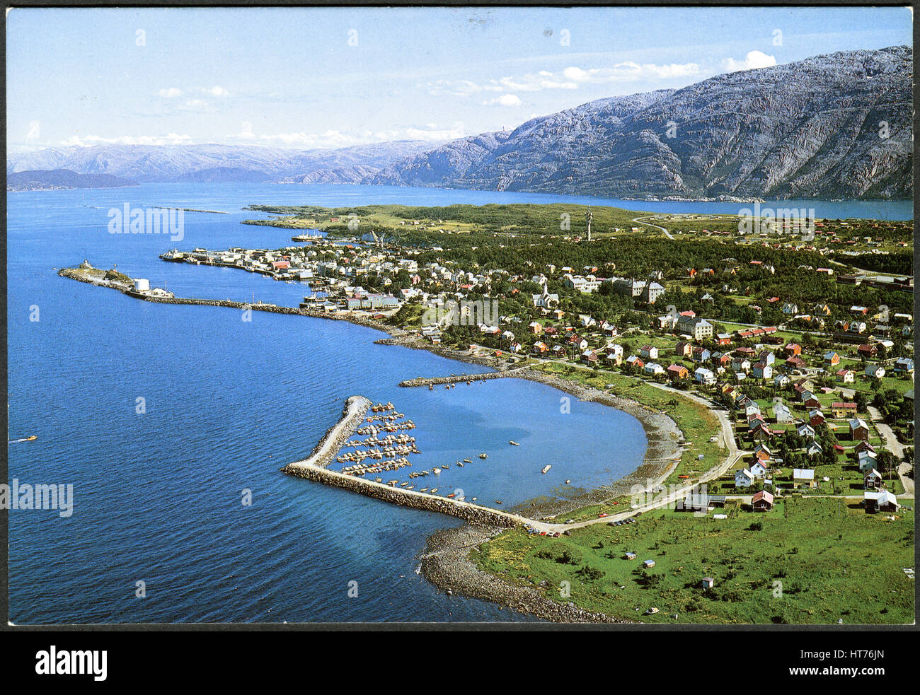 NORWAY - CIRCA 1981: A postcard printed in Norway, show the Sandnessjoen seen from the air, circa 1981 Stock Photo