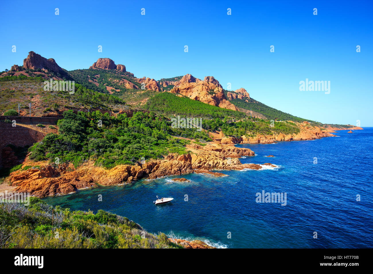 Esterel mediterranean red rocks coast, beach and sea. French Riviera in Cote d Azur near Cannes Saint Raphael, Provence, France, Europe. Stock Photo