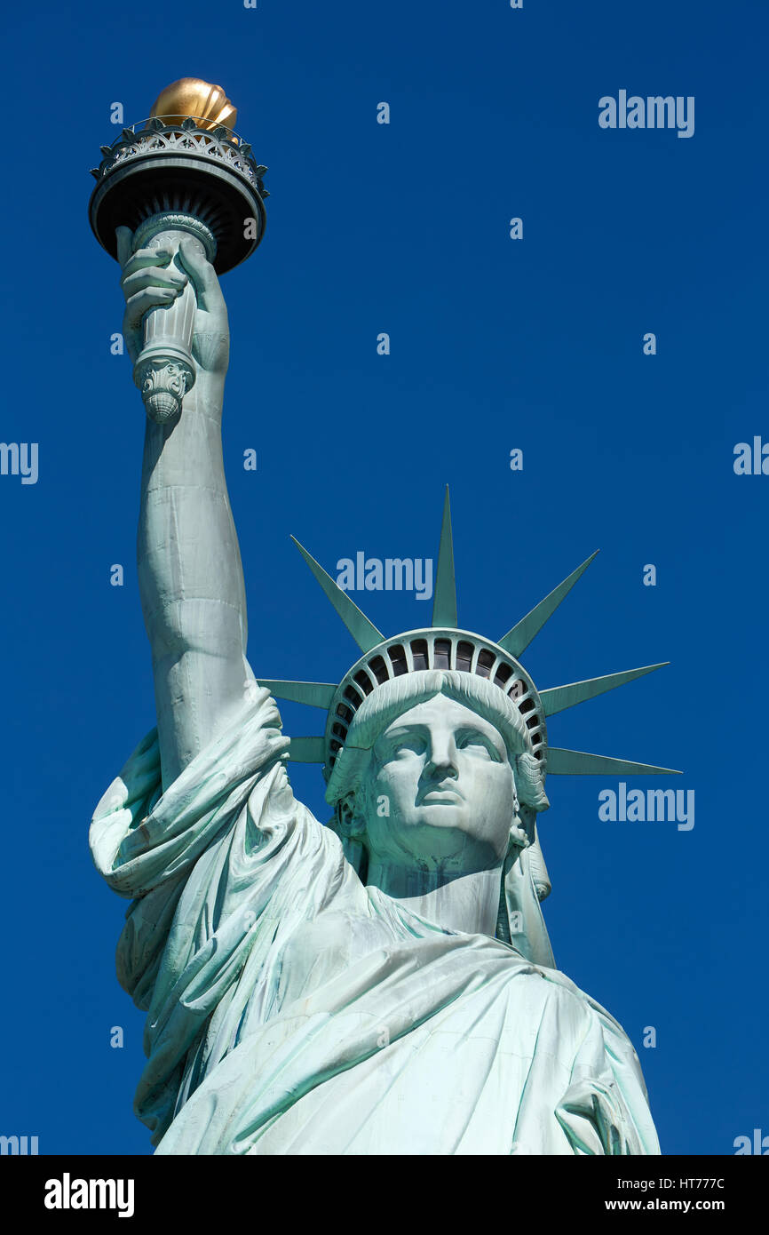 Statue of Liberty, blue sky in a sunny day Stock Photo