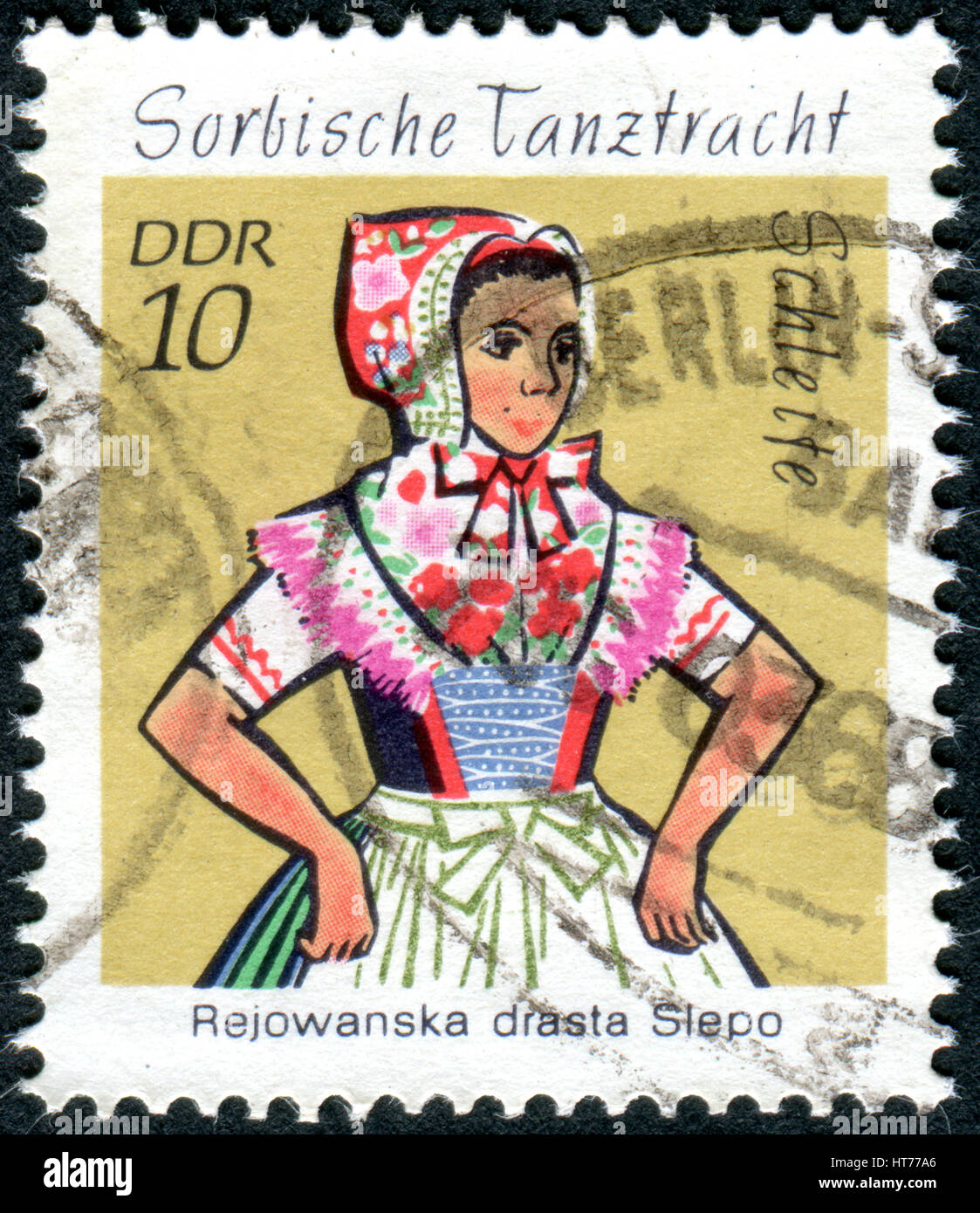 GERMANY - CIRCA 1971: A stamp printed in Germany (GDR), shows the Sorbian Dance Costumes from Schleife, circa 1971 Stock Photo