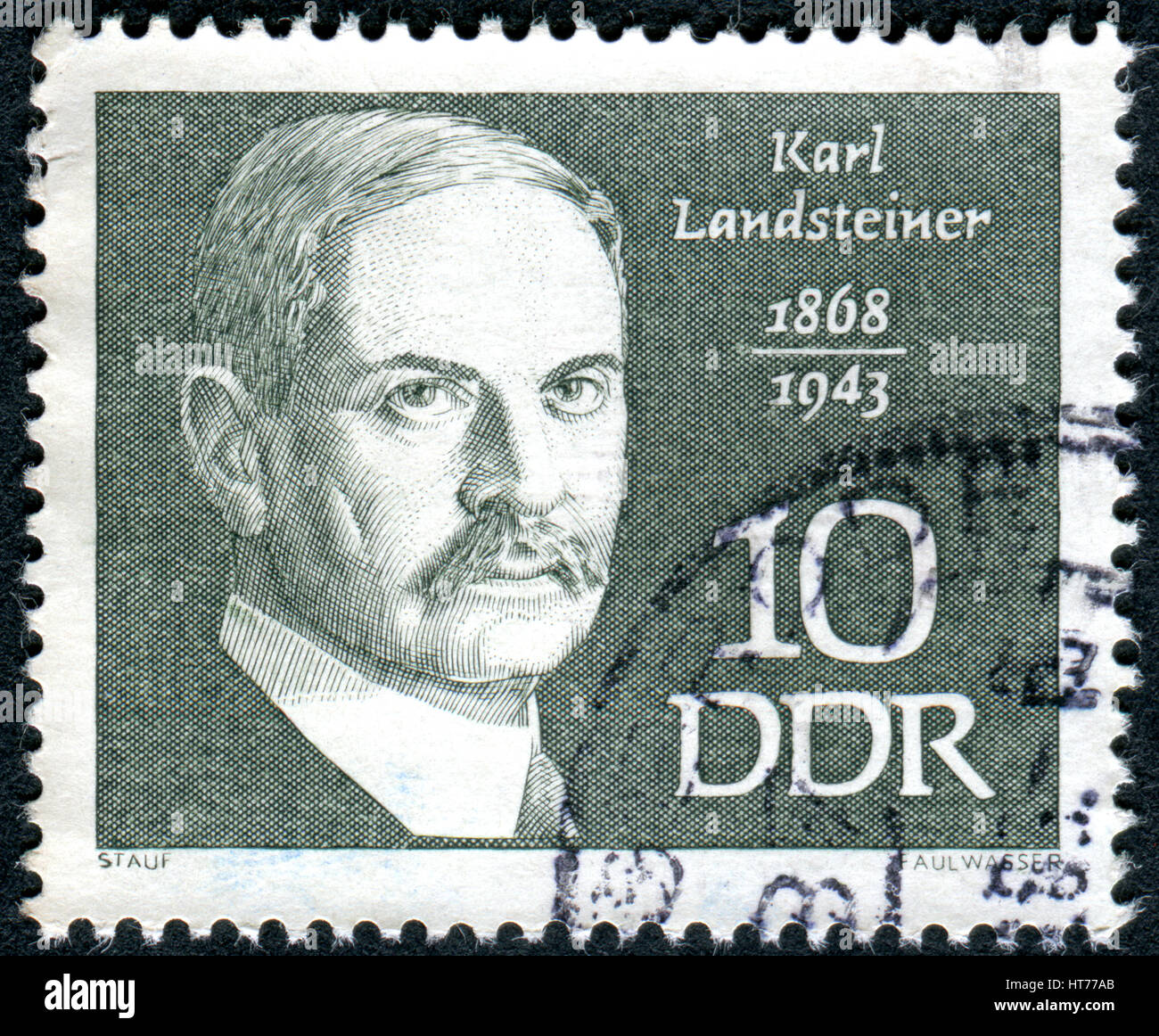 GERMANY - CIRCA 1968: A stamp printed in Germany (GDR), shows an Austrian biologist and physician Karl Landsteiner, circa 1968 Stock Photo