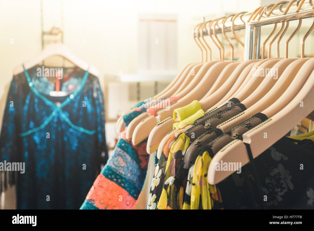 clothes hanger showcase in store shopping,Light flare effect Stock