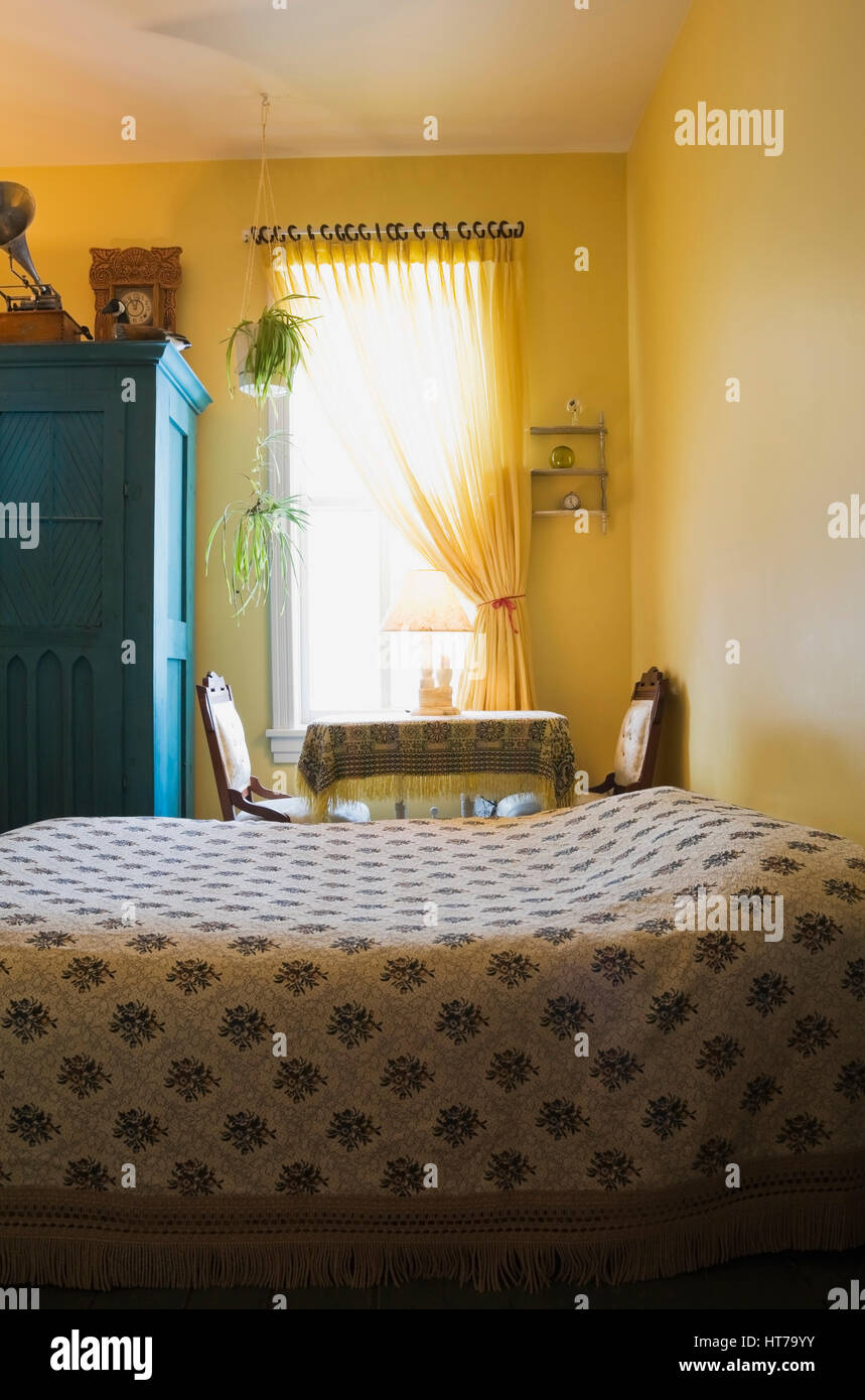 Master Bedroom With Floral Bedspread In 1904 Victorian Old