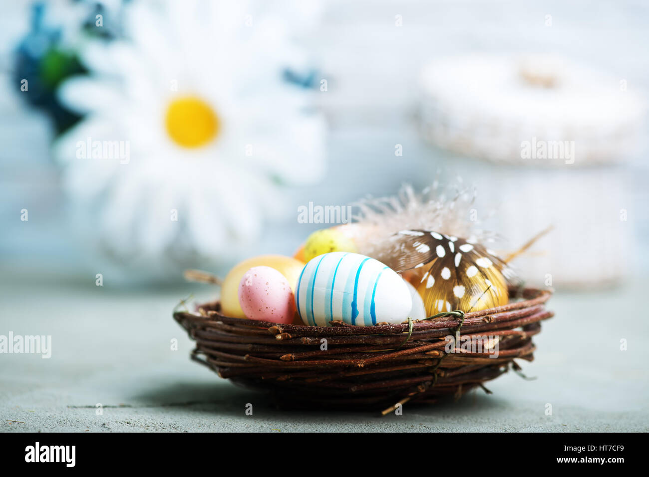 color easter eggs on the table, easter background Stock Photo