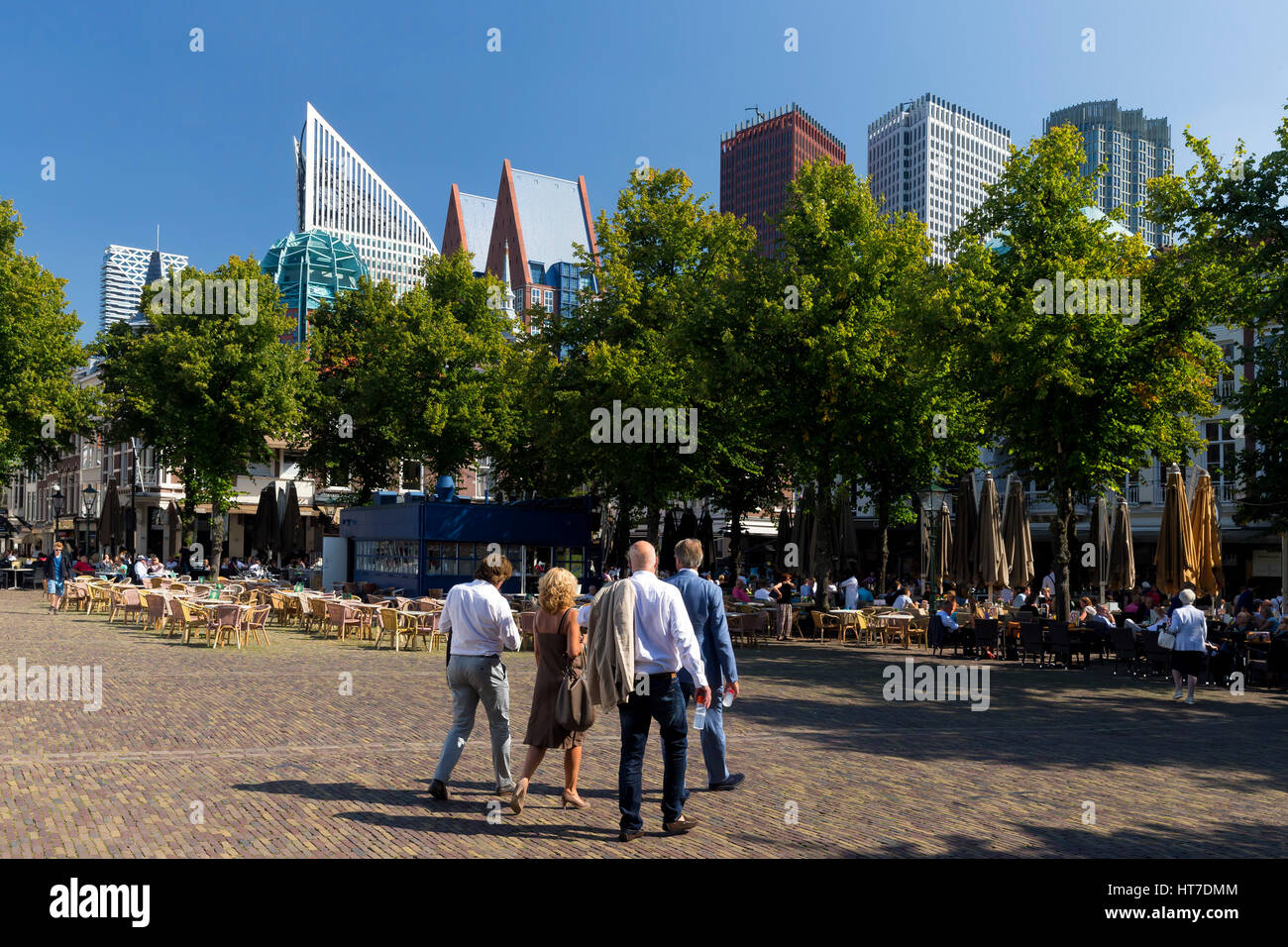 Visitors and tourists in Square Het Plein with Skyscrapers behind, city centre, The Hague, Netherlands, Europe Stock Photo