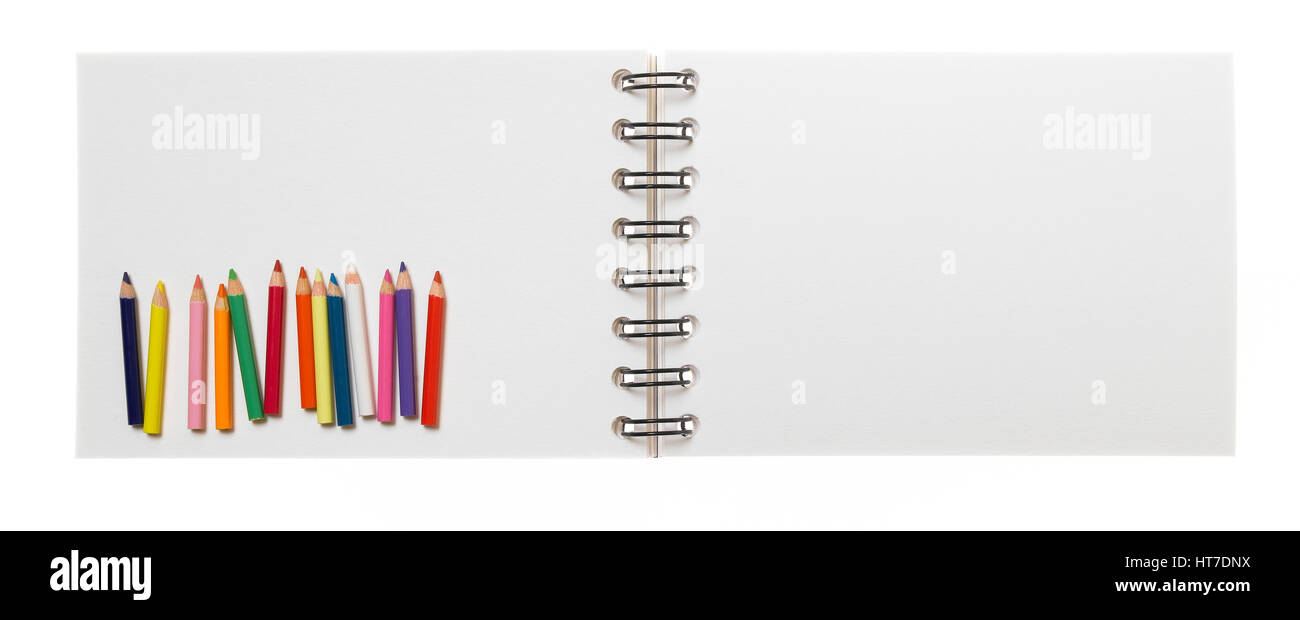 Isolated note Pad with pencil Stock Photo