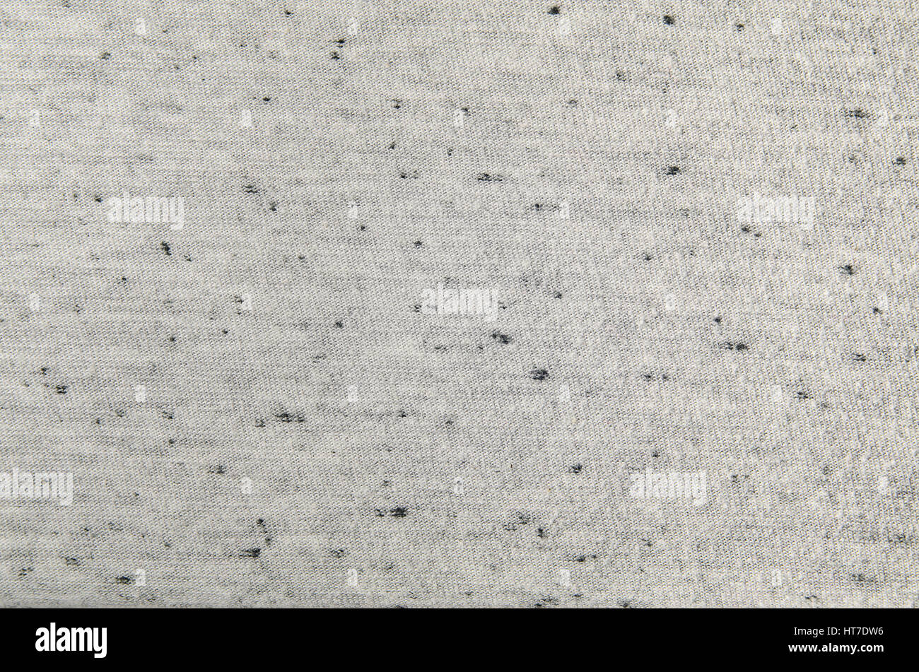 Gray fabric texture with black specks. Cloth background Stock Photo