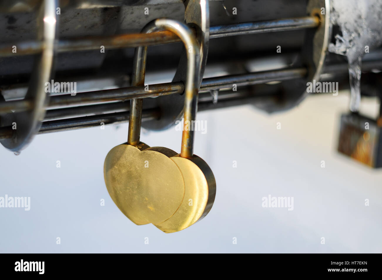 Pink Padlock in the shape of heart on modern steel chrome railing Stock ...