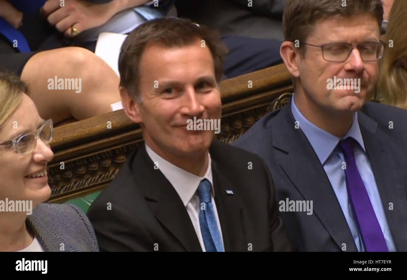 Health Secretary Jeremy Hunt smiles as Chancellor of the Exchequer ...