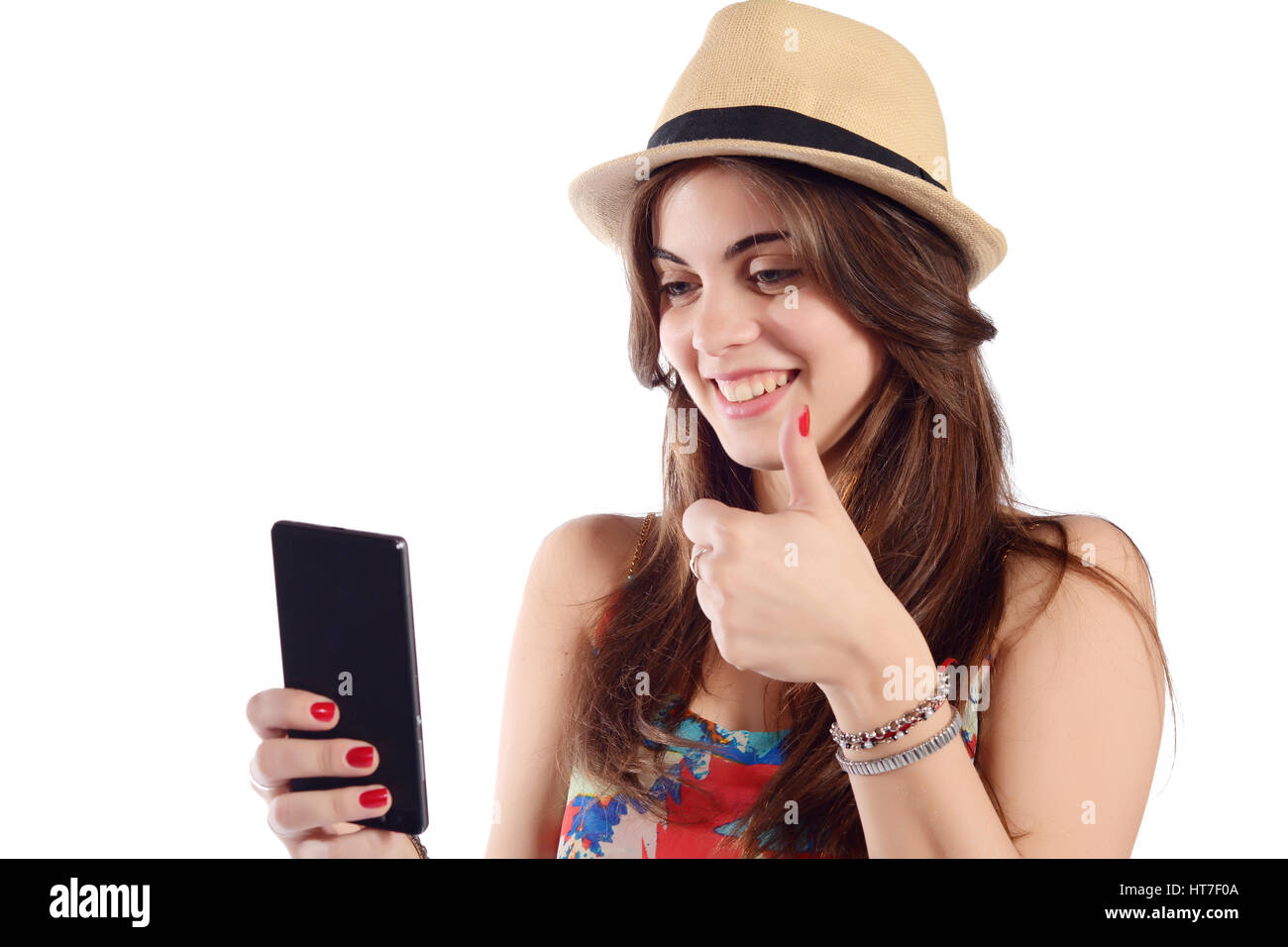 Young beautiful woman taking selfie with smartphone indoor. Isolated ...