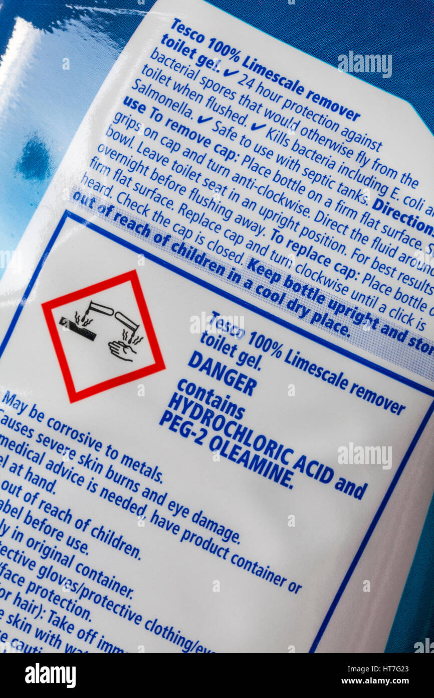 Label on back of Tesco 100% limescale remover toilet gel - danger contains hydrochloric acid and PEG-2 oleamine Stock Photo