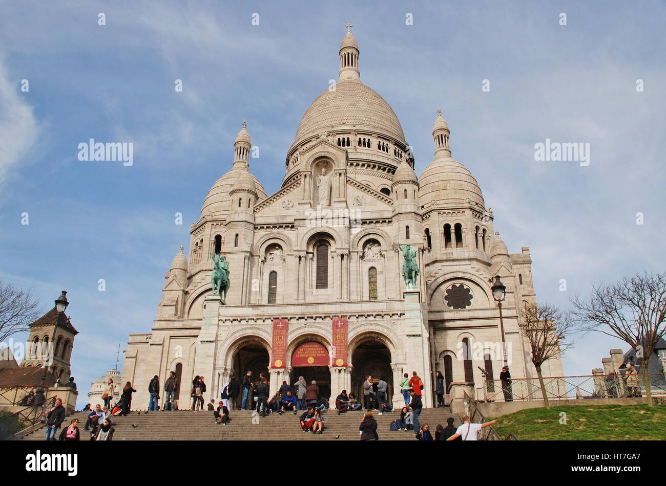 Exterior of the Sacre Coeur cathedral at Montmartre in Paris, France. Designed by Paul Abadie, construction took place between 1875 and 1914. Stock Photo