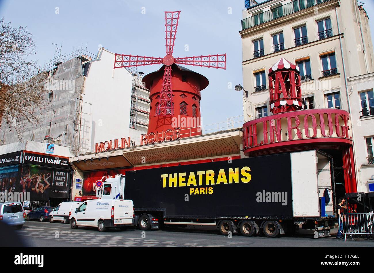 Exterior view of the famous Moulin Rouge cabaret theatre in Paris, France. The venue first opened in 1889 and was rebuilt in 1921. Stock Photo