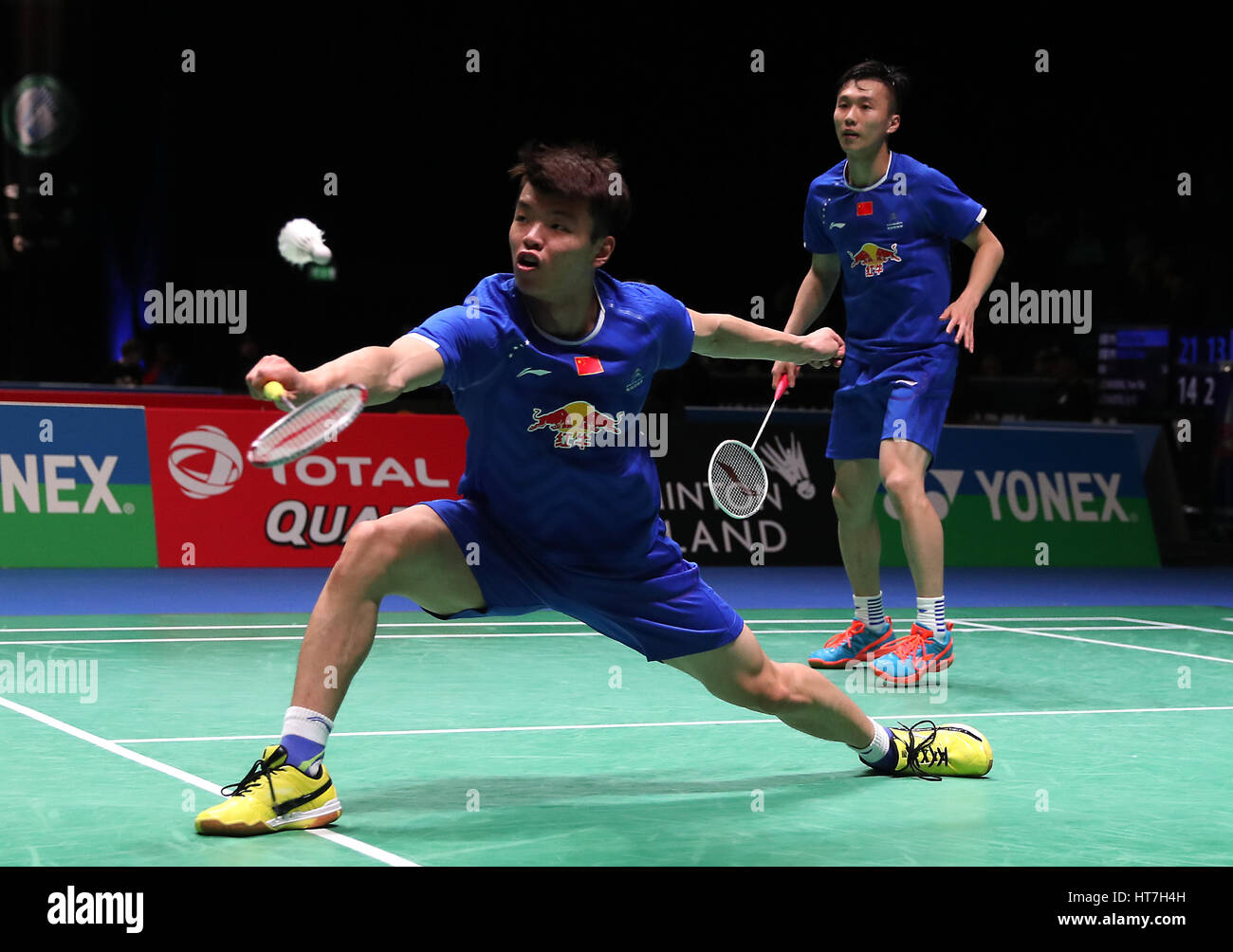 China's Wang Yilyu (left) and Huang Kaiiang in action during the Men's doubles match during day two of the YONEX All England Open Badminton Championships at the Barclaycard Arena, Birmingham. Stock Photo