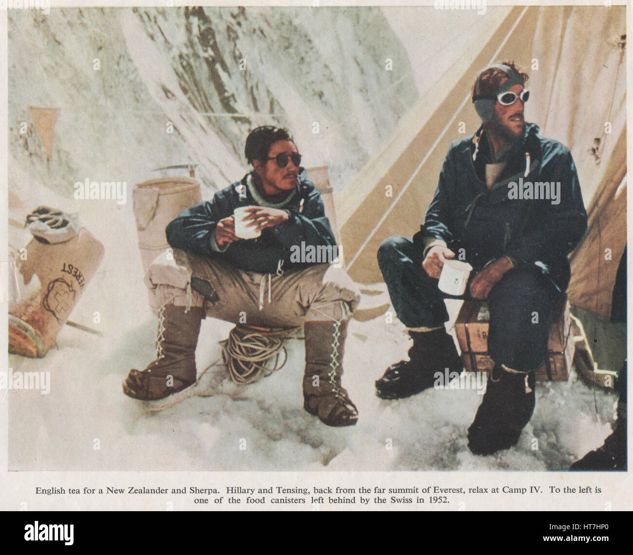 Photo of Sir Edmund Hilary and Sherpa Tenzing Norgay in camp IV during the 1953 Everest Expedition and the succesful summit on 29 May 1953.  Scanned photo from The Times Everest supplement published 1953 Stock Photo