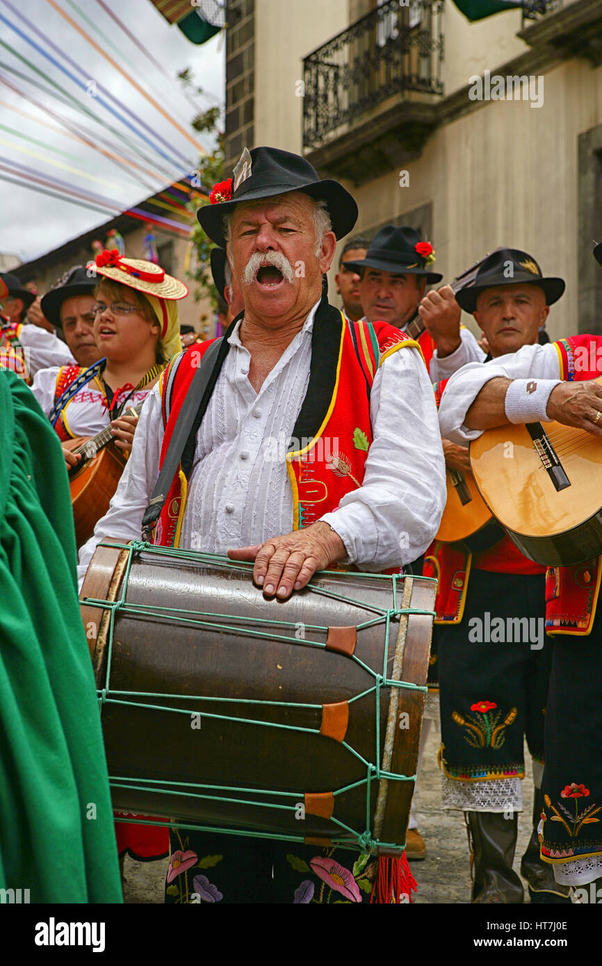 Men And Women In A Traditional Atire Singing At Corpus Christi Celebration At La Orotava, Tenerife Stock Photo