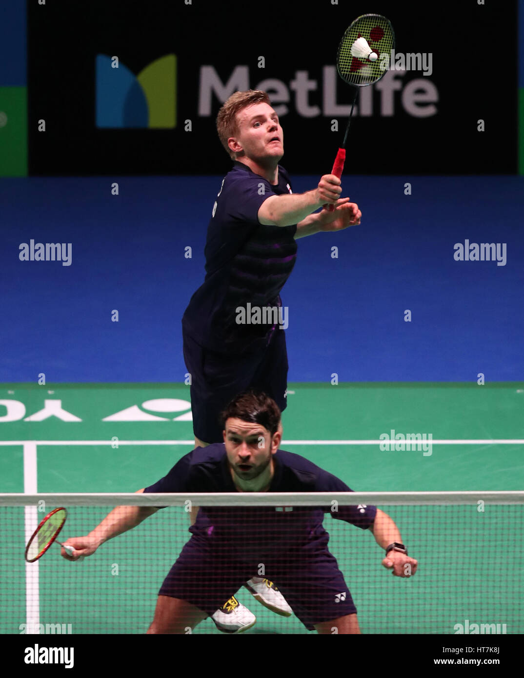England's Chris Langridge (front) Marcus Ellis in action during the Men's doubles match during day two of the YONEX All England Open Badminton Championships at the Barclaycard Arena, Birmingham. Stock Photo