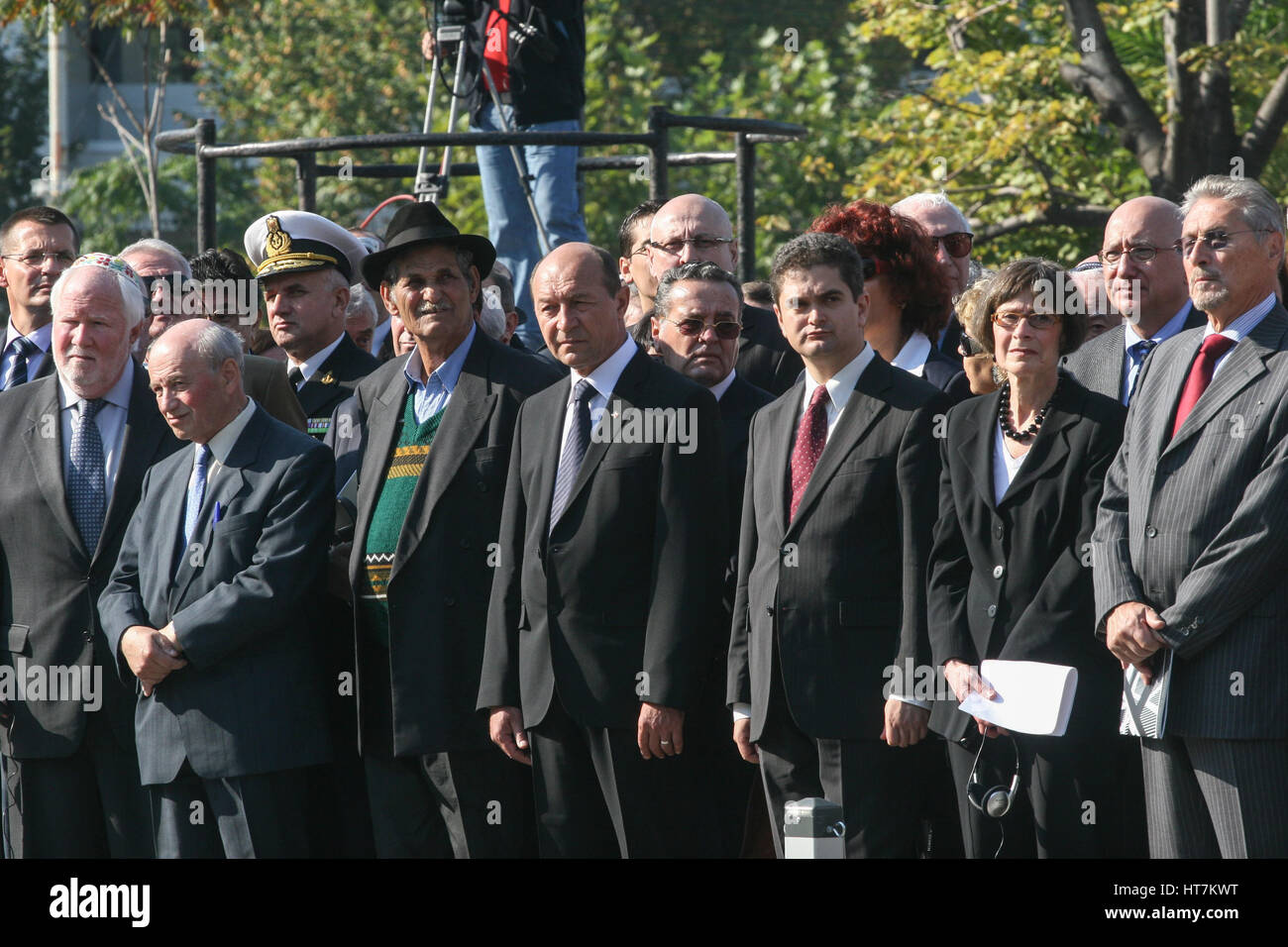 Bucharest, Romania, October 8, 2009: Traian Basescu (C), Emil Constantinescu (R), Theodor Paleologu (C right) and other officials participate at the o Stock Photo