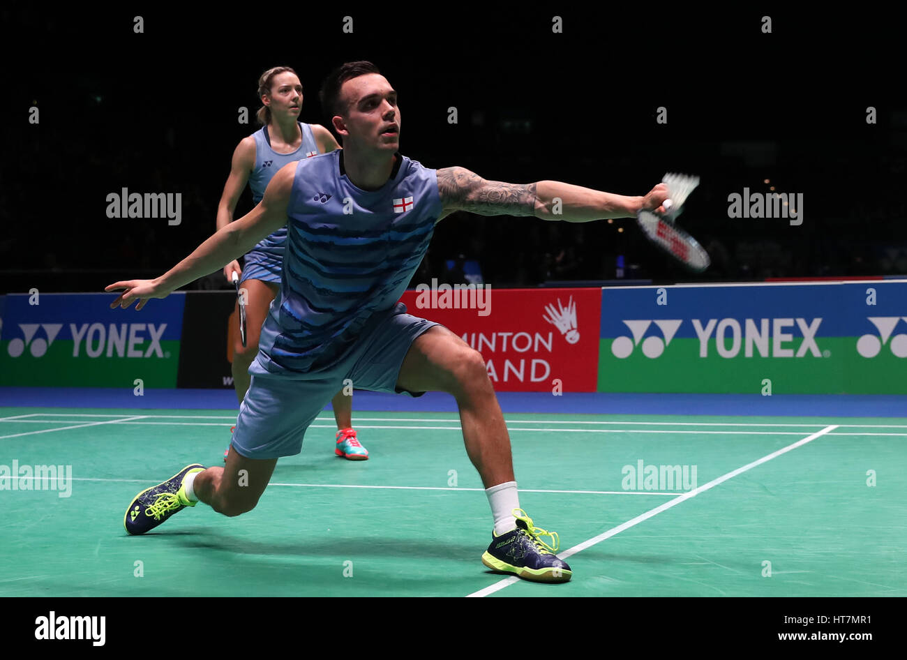 England's Chris Adcock (front) and Gabrielle Adcock in action during the Mixed doubles match during day two of the YONEX All England Open Badminton Championships at the Barclaycard Arena, Birmingham. Stock Photo