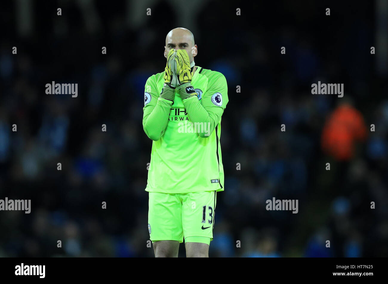 Manchester City goalkeeper Willy Caballero looks frustrated after a missed chance during the Premier League match at the Etihad Stadium, Manchester. Stock Photo