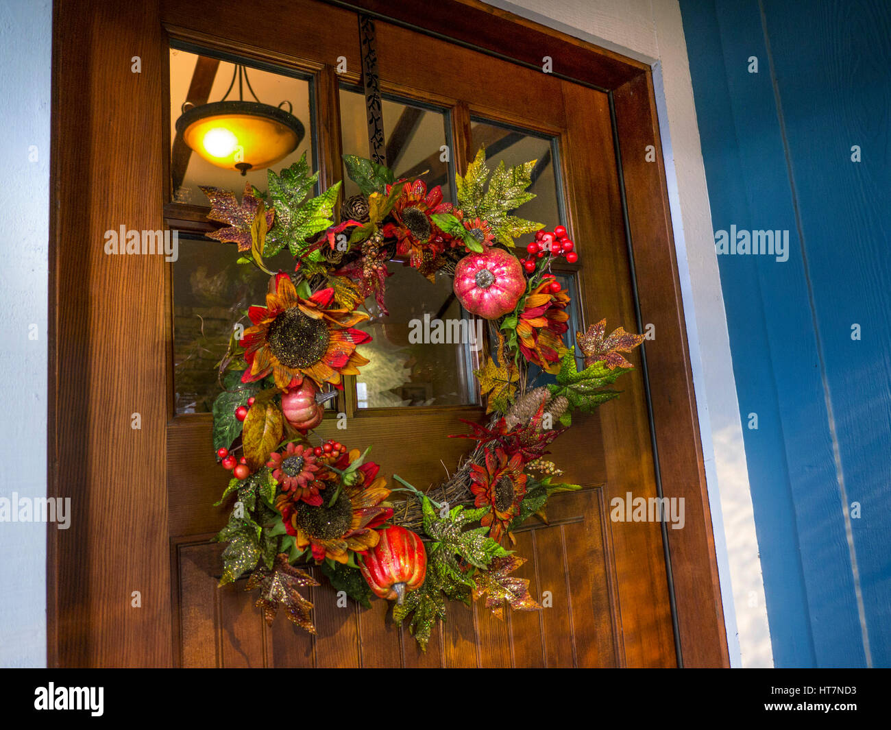 Autumnal traditional Thanksgiving / Christmas  wreath decorations on a front door of a Pacific Grove home Monterey California USA Stock Photo