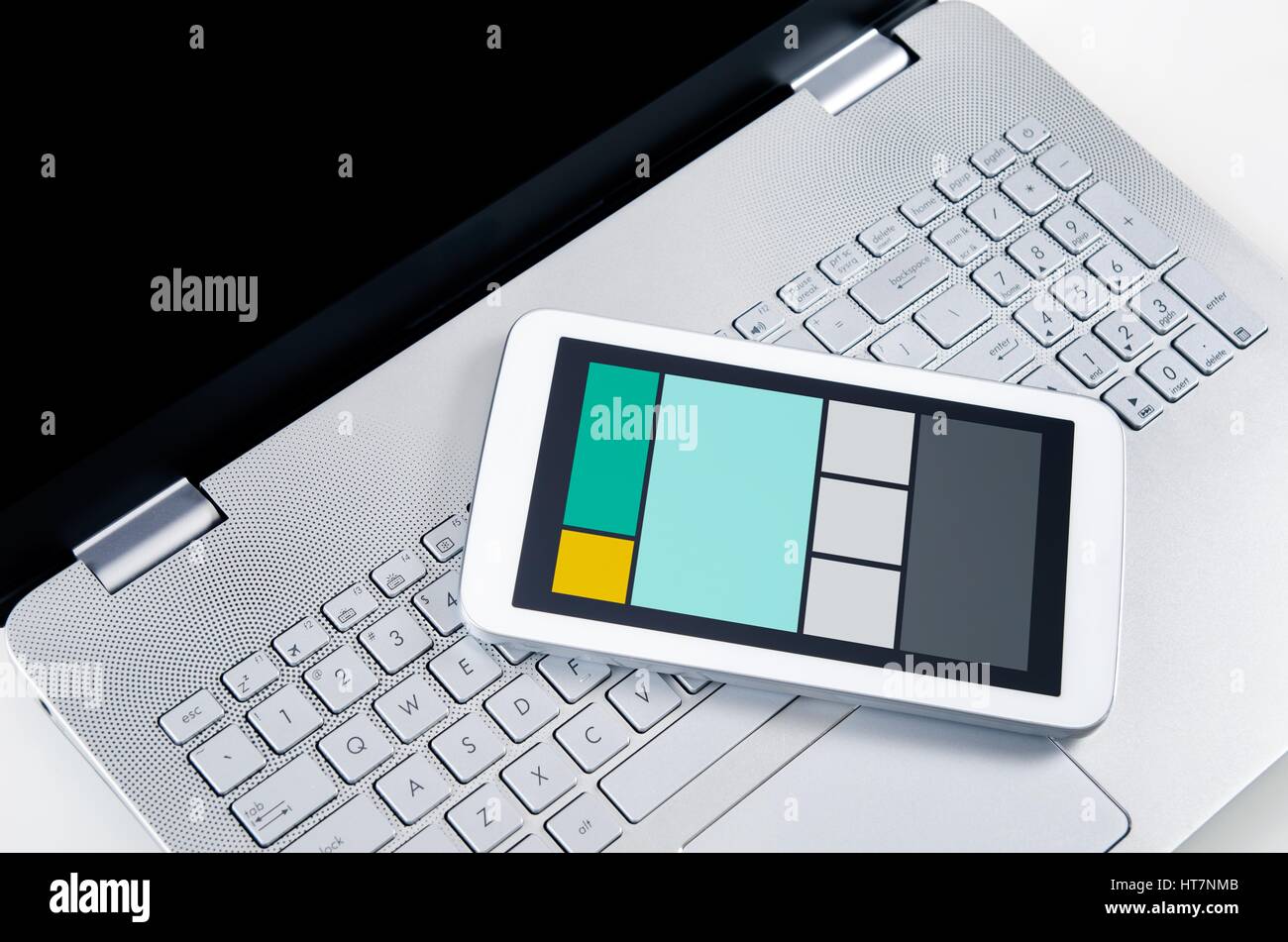 Responsive web design on mobile devices laptop and tablet pc Stock Photo